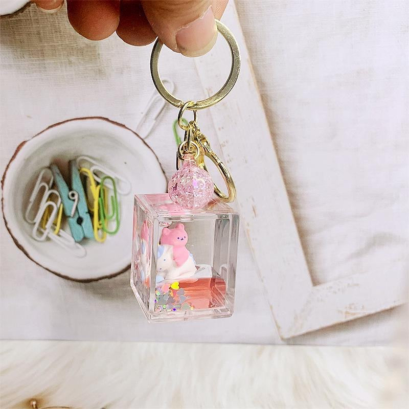 Trending Cute Liquid Sand Keychain | Glow-in-the-Dark Floating Charms | Lucky Cat / Bear / Astronaut Unicorn